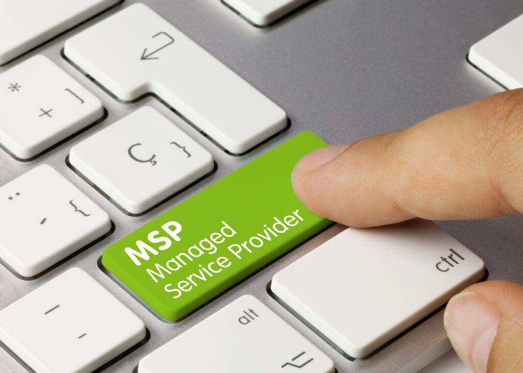 A man pressing the Msp managed service provider key